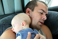 Oscar asleep on Uncle Jason