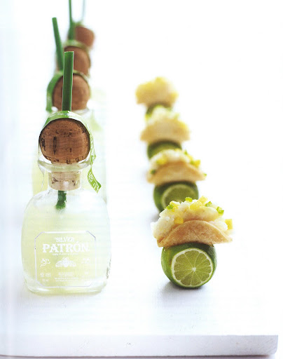 Dainty citrus-marinated fish tacos paired with a shot of tequila. Dainty citrus-marinated fish tacos paired with a shot of tequila.