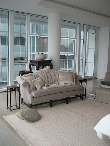 I bought this sofa years ago from a consignment shop in Connecticut and since had it re-upholstered twice: first in a beige cotton duck and now in this gray wool. I had the throw made from one of my mother's old fur coats.