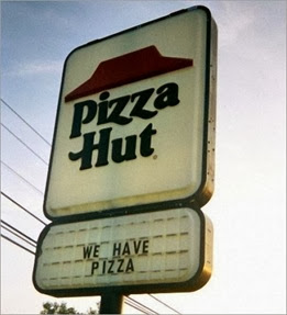 c0 This Pizza Hut sign also says 'We Have Pizza,' in case anyone was wondering