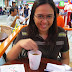 Wifey swirling her coffee at Roti Mum