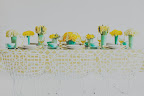 Why limit yourself to one fabric? Dress half of your tables in yellow oilcloth.
