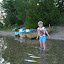 David by the boats at our cottage on Crystal Lake. &ndash; 01-Aug-2010