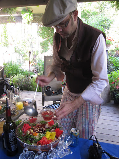 Mixologist Adam Seger prepares a beautiful punch.