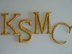 We found these letters at Tinsel Trading. Each of our initials: Kate, Shira, Michael, and Colleen.