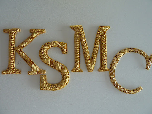 We found these letters at Tinsel Trading. Each of our initials: Kate, Shira, Michael, and Colleen.