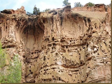 The canyon cliffs are formed from volcanic ash called tuff