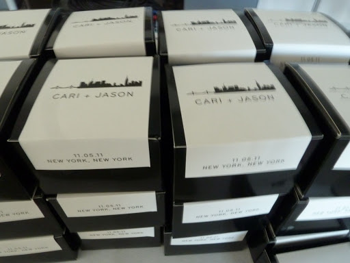 It was a sea of favor boxes. This was a really easy favor to package, a simple glossy black box, some yummy cookies, and a custom sticker to seal it (designed by Hello!Lucky).