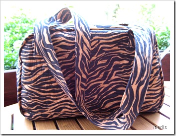 Foto Handtasche mit Animaldruck