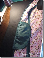 The completed hidden pocket from the wrong side.  The pocket has been tacked to the princess seam to prevent it from drooping when items are in the pocket.