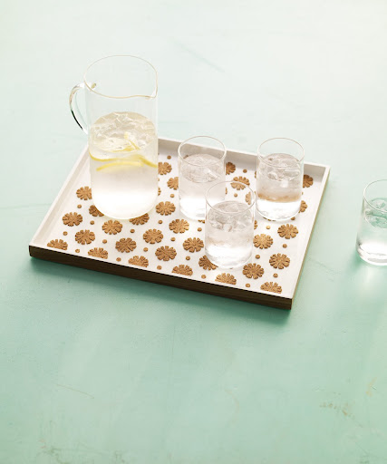 I love this Martha Stewart tray that was made from punched-out corks, the perfect way to design a tray and it will keep your drinks, plates, and bowls from sliding around on the tray. I love this Martha Stewart tray that was made from punched-out corks, the perfect way to design a tray and it will keep your drinks, plates, and bowls from sliding around on the tray.