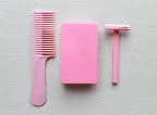 I love these worn pink plastics (comb, travel soap dish, single-blade razor)