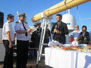 Ben presents a copy of his book From Victoria to Vladivostok to the captain and crew of the Russian scientific training ship Pallada