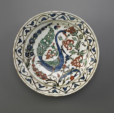 Plate | Origin:  Iznik,  Turkey | Period: late 16th-early 17th century  Ottoman period | Details:  Not Available | Type: Stone-paste painted under colorless glaze | Size: H: 6.0  W: 28.1  cm | Museum Code: F1972.4 | Photograph and description taken from Freer and the Sackler (Smithsonian) Museums.