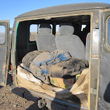 This photo shows how dusty it was inside the van after a day on the steppe. That is my blue backpack in the center.