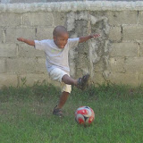 Michael kicking the ball with style
