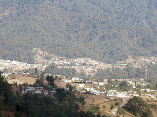 School from hillside above and to the left (south) of worksite.Photos by TOM HART