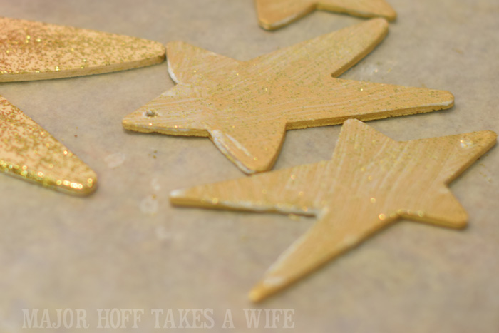 Painting handmade ornaments. Second coat with chunky glitter paint. Looking for homemade Christmas gifts? Look no further than these homemade Christmas ornaments. Use them as tree decorations, to grace your holiday table, or for fun tags to gifts! The ideas and endless and your friends and family will love these glittery stars personalized just for them! Painting handmade ornaments Second coat with chunky glitter paint. Looking for homemade Christmas gifts? Look no further than these homemade Christmas ornaments. Use them as tree decorations, to grace your holiday table, or for fun tags to gifts! The ideas and endless and your friends and family will love these glittery stars personalized just for them!