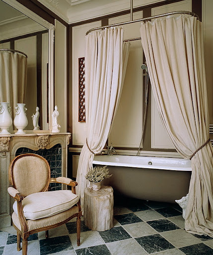 Old world style and sophisticated neutral color palette help to make this bathroom feel calm and regal. (homebunch.com) Old world style and sophisticated neutral color palette help to make this bathroom feel calm and regal. (homebunch.com)