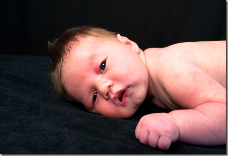 James Cook Newborn On Stomach 3