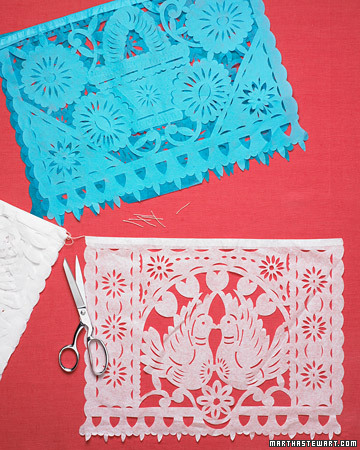 You can find these colorful paper flags at craft stores. Cut them apart for easy, festive placemats. (marthastewart.com) You can find these colorful paper flags at craft stores. Cut them apart for easy, festive placemats. (marthastewart.com)
