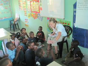 The first grade class participating in morning meeting with Profe Sarah.