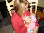 Nana feeds our little girl.