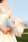 I thought a feather bouquet would be a great keepsake. Every time I see it on my dresser, it's an instant pick me up.