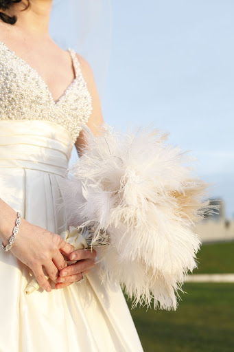 I thought a feather bouquet would be a great keepsake. Every time I see it on my dresser, it's an instant pick me up.