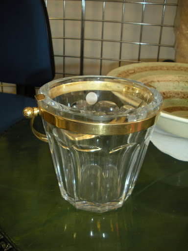 The classic gilded edge is so sophisticated on this pail. It would make the perfect addition to a home bar.