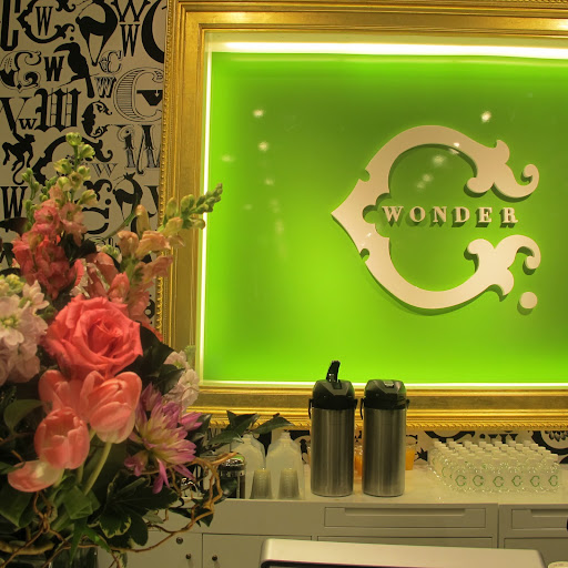 An impromptu coffee bar was set up behind the normal register area. That punchy black & white wallpaper pattern is printed on their bags and boxes, too!