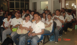 Faculty and students await boarding the ferry to the island.