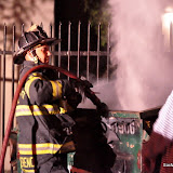 Sac City Firefighters, Engine 56, extinguish a dumpster fire at an apartment complex in South Sacramento. News_110704_DumpsterFire_43rdAve