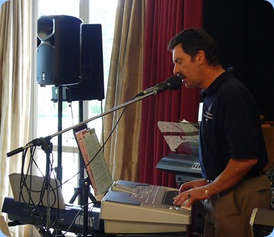 Peter Littlejohn playing and singing with his Korg Pa1X. Photo courtesy of Dennis Lyons.
