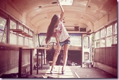 girl in empty bus
