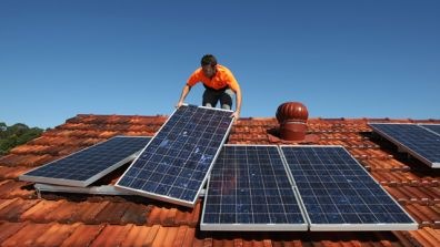 [Man-Assembles-Solar-Panels-Roof-Home%255B2%255D.jpg]