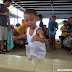 Camp Holiday is child-friendly! Kids play the water relay with family at Camp Holiday