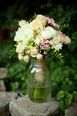 This is my bouquet. To make it, I studied online tutorials and on the morning of the wedding my best friend and I went to a local floral wholesaler to pick up an assortment of peonies, ranunculus, and spray roses. The rosemary and sage in the boutonnieres were from our garden. This is my bouquet. To make it, I studied online tutorials and on the morning of the wedding my best friend and I went to a local floral wholesaler to pick up an assortment of peonies, ranunculus, and spray roses. The rosemary and sage in the boutonnieres were from our garden.