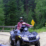 Eidan on an ATV with James