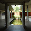 You come in and look at a beautiful pond with plants and fish (which you will see later what exactly their function is ;-)), the learning cubicles to the left and an open space to the right