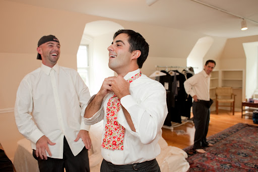 ryan and craig sharing a laugh, presumably about craig's fantastic patterned ascot.