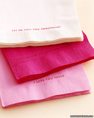 Put everyone in a romantic mood with napkins in shades of pink and white dressed up with old song titles or favorite lines of poetry. (marthastewartweddings.com) Put everyone in a romantic mood with napkins in shades of pink and white dressed up with old song titles or favorite lines of poetry. (marthastewartweddings.com)
