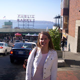 Debbie in Front of the Public Market Sign