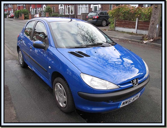 Peugeot 206 for sale - the white marks are reflections, not scratches!
