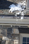 Please stay far away from the roof line, as snow has been avalanching off of it.
