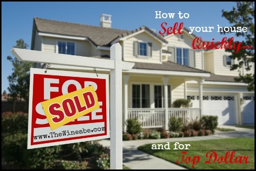 Sold Home For Sale Sign and House