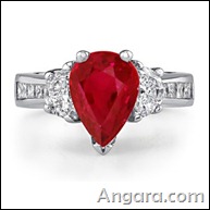 Pear Ruby and Diamond Three Stone Ring in Platinum