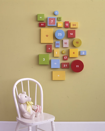 I love this advent calendar -- which is made up of 25 boxes that are all different sizes and shapes. It makes a creative design on the wall you mount the calendar on. I love this advent calendar -- which is made up of 25 boxes that are all different sizes and shapes. It makes a creative design on the wall you mount the calendar on.