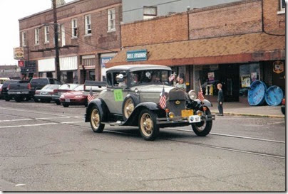 058-1 1930 Ford Model A in front of Bryant Building in Rainier, Oregon in July 2002