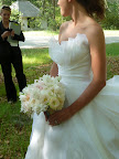 Carol Hannah made Katy's dress. The soft bouquet really set off the crisp white hue of the gown.